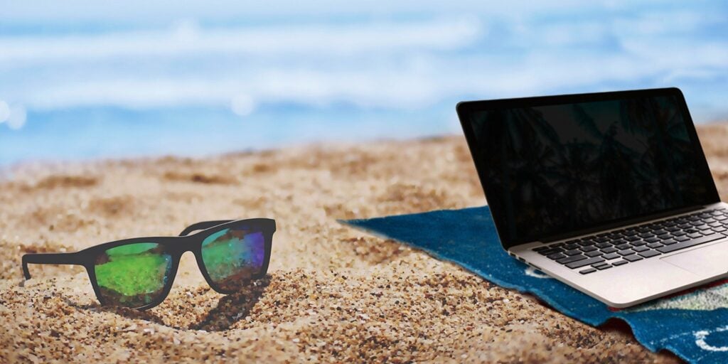 Computer at beach to book online