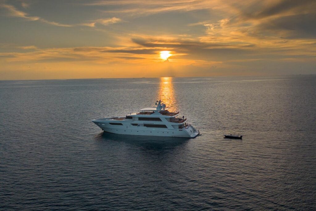 Maldives Master liveaboard dive boat at sunset