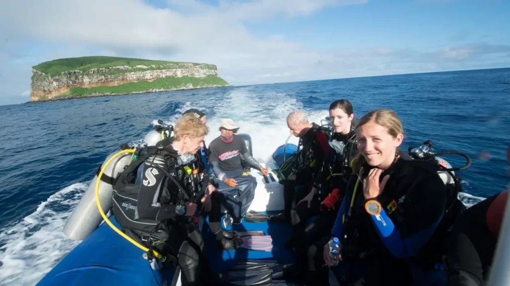 Divers head out for the first dive of the day aboard Galapagos Master