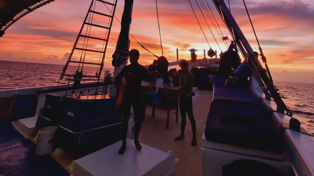 Sunset falls over the bow of Philippine Siren signalling the end of another day