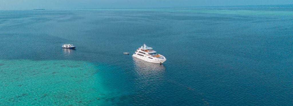 “Maldives Master liveaboard by coral reef — Maldives liveaboard diving