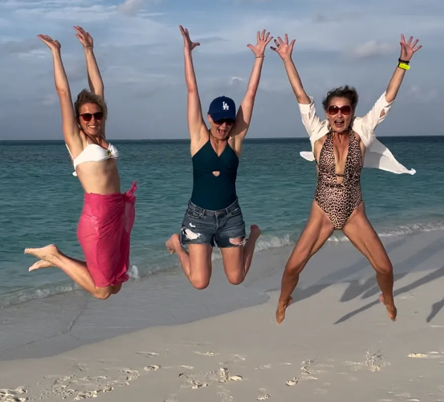 Divers enjoying a beach visit during a Maldives Liveaboard trip